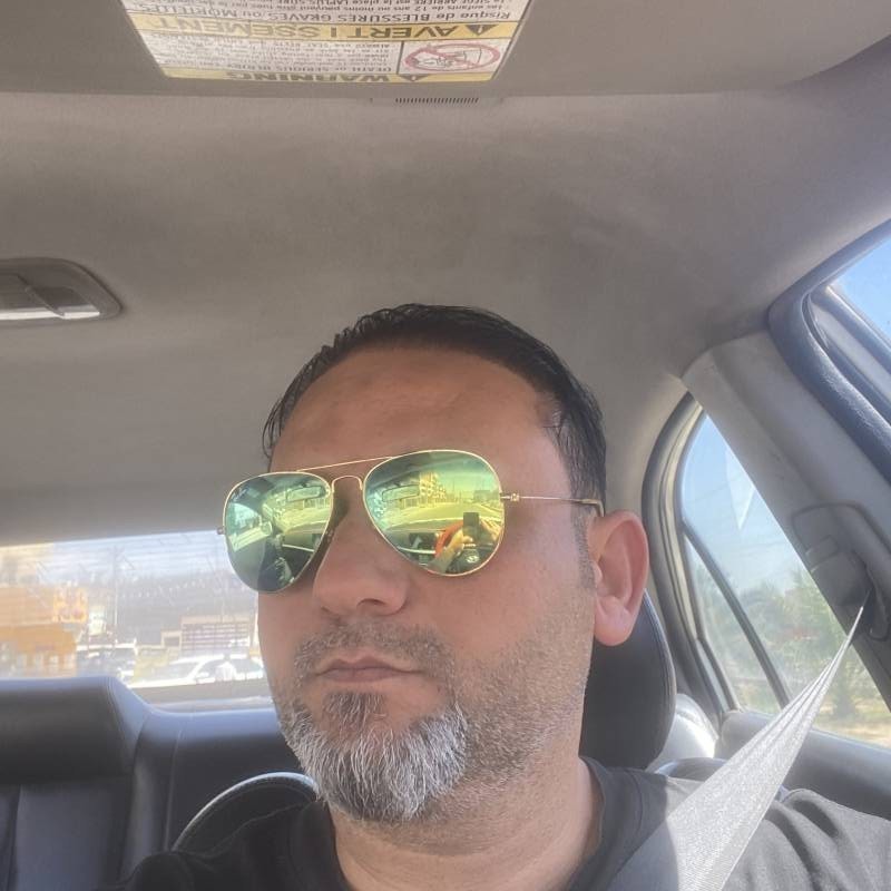 Ayman, 42, Iraq