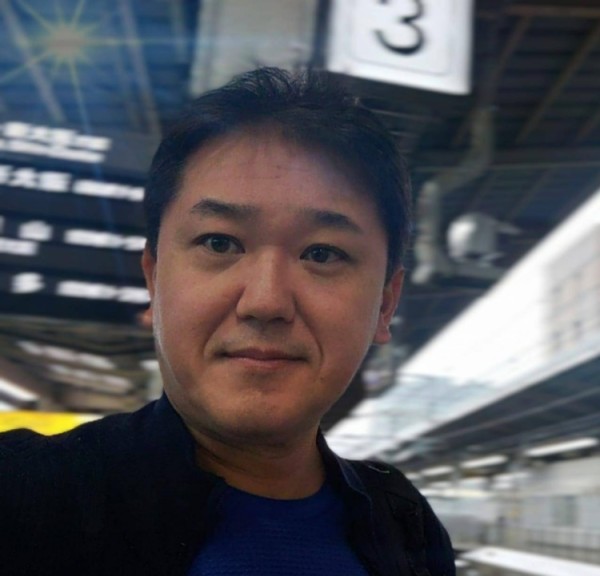 Zhang, 54, Holon